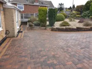 Block paving driveway with intricate pattern and vibrant colours