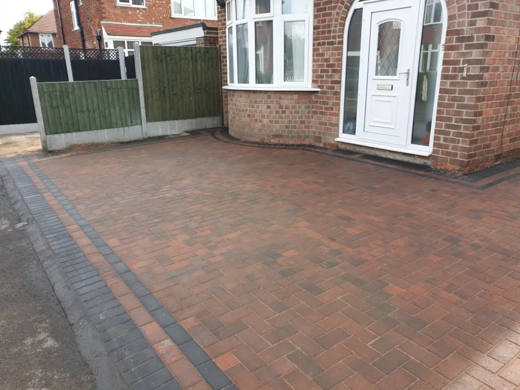Innovative block paving designs for driveways in Nottingham, featuring herringbone and stretcher bond patterns.